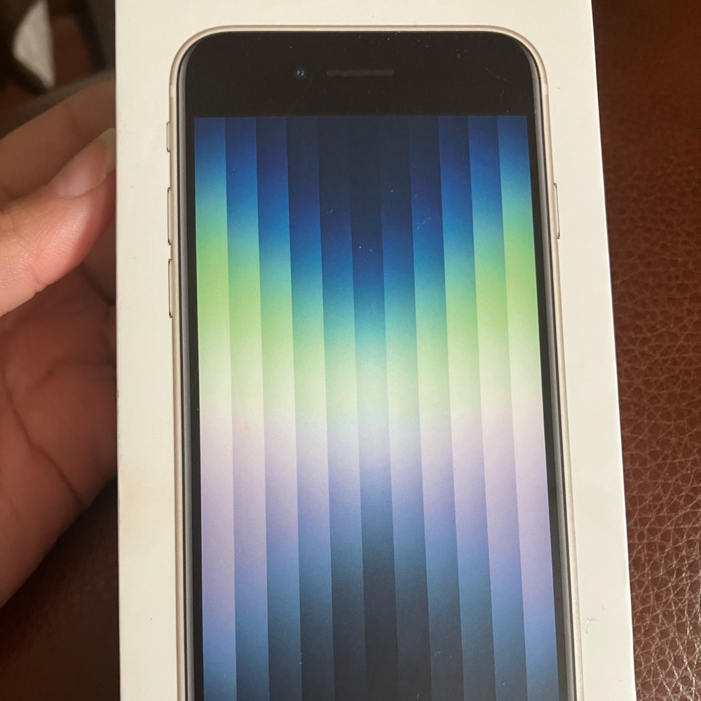 Blue iPhone SE. used for a month. Need a SIM card to use.